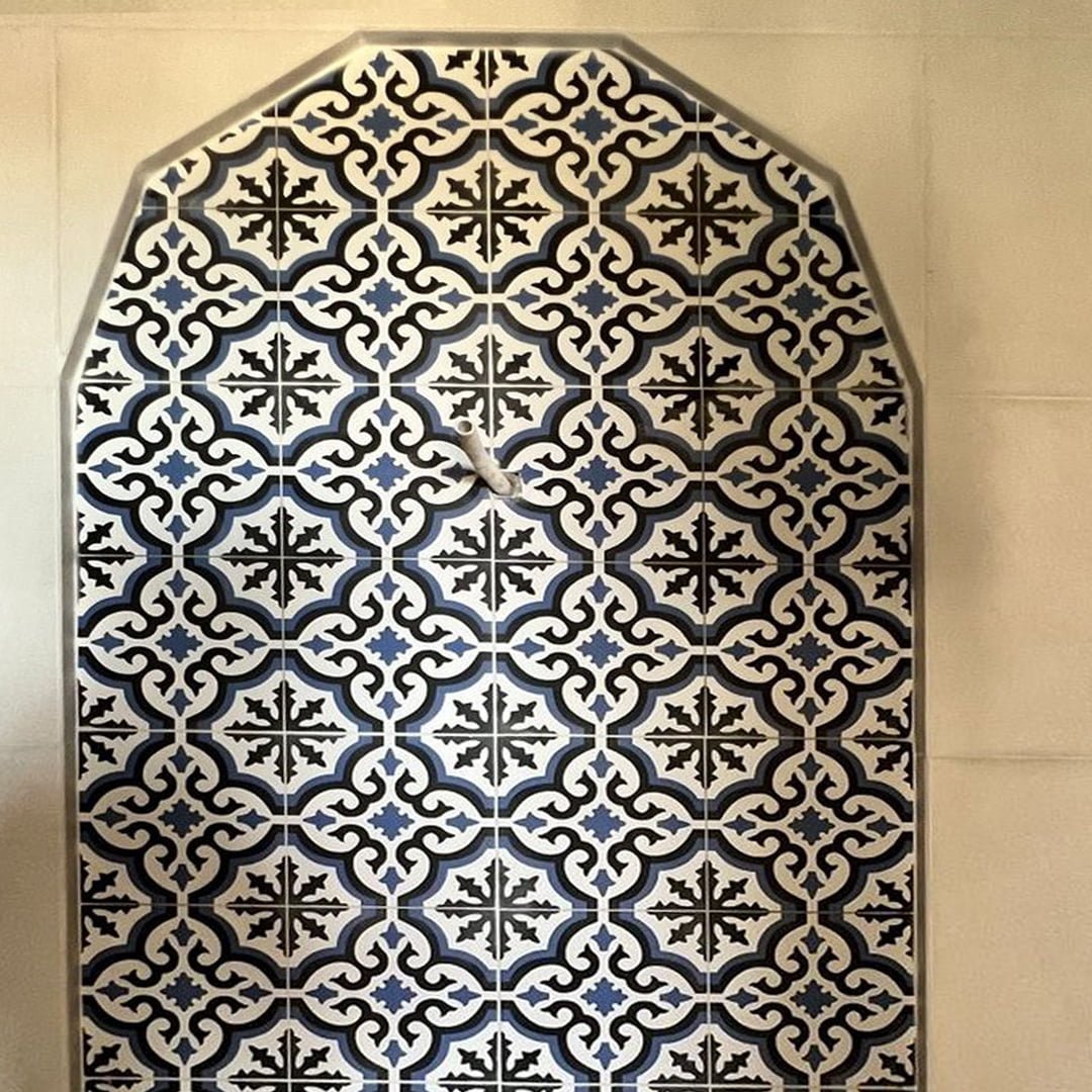 Tiling Works by Precision Construction