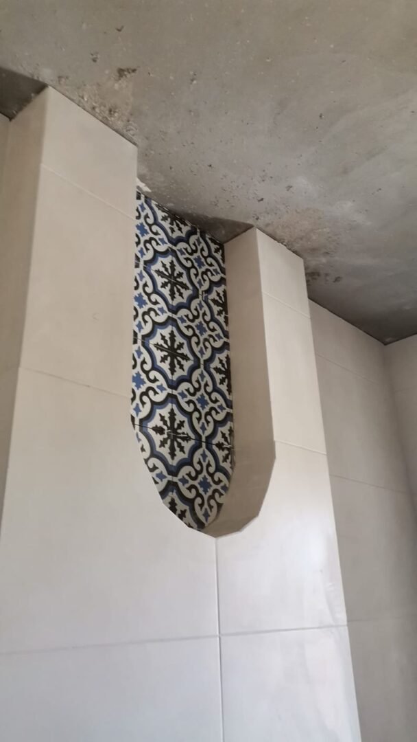 Tiling Works by Precision Construction