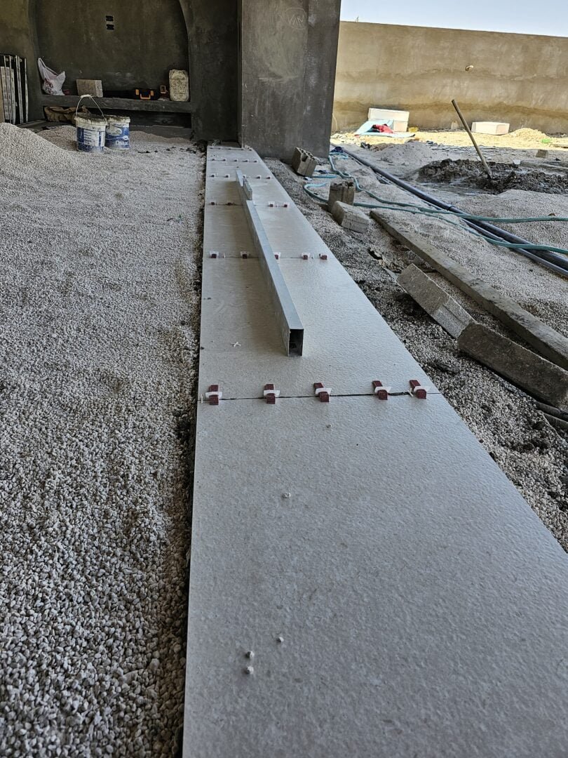 Tiling Works by Precision Construction